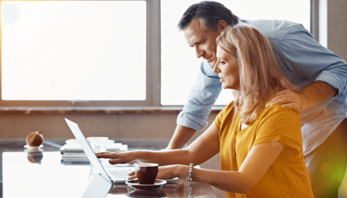 Couple considering finances, financial advice, planning, inflation